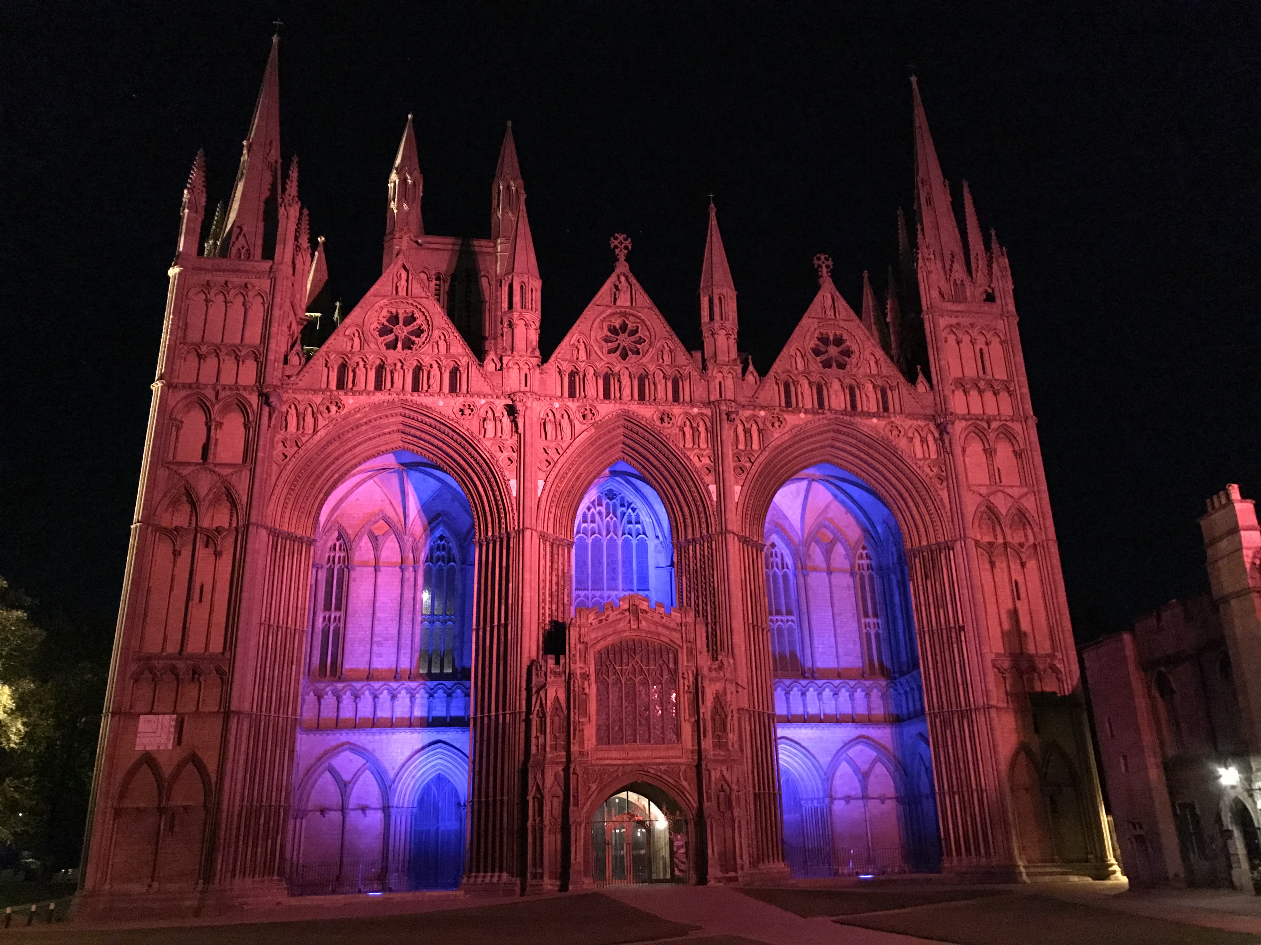 The Cathedral west front lit with pink and blue floodlights